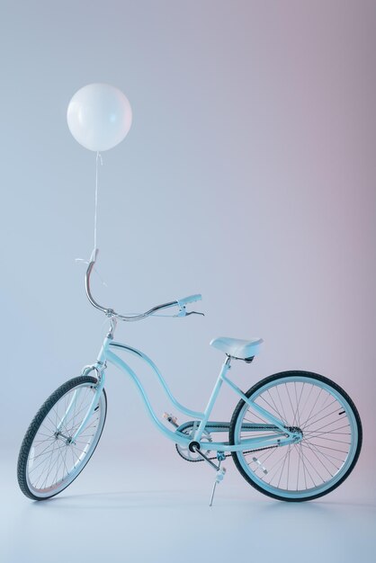 Photo bicycle with white balloon