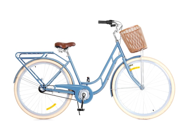 bicycle with wicker basket on white background