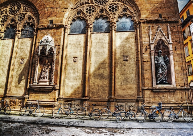 Bicycles by Orsanmichele church in Florence Italy