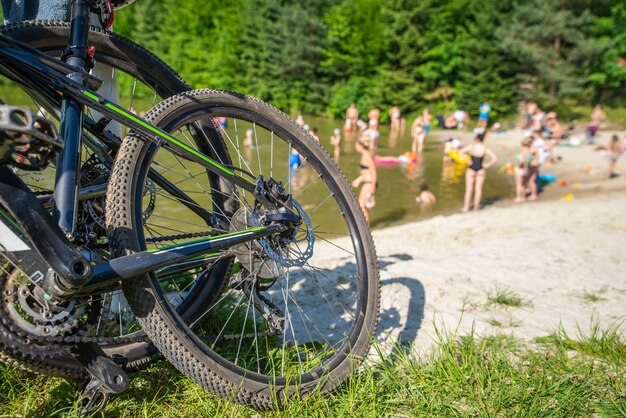 Bicycles close up sand beach on background