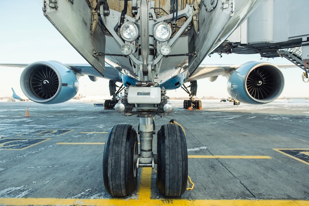 Big airplane boarding at the international airport