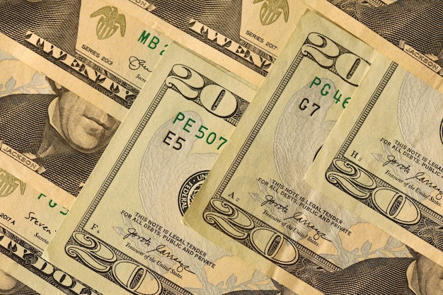 Big amount of old 20 dollar bills details on macro photography Money earnings payday or tax paying period