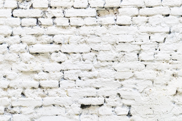 Big background of an old white brick wall