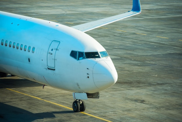 Big beautiful plane after flight standing on airport runway