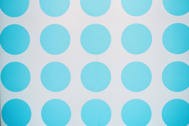 Big blue polka dots on white background