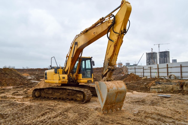 Big bright yellow powerful industrial heavy excavator tractor bulldozer specialized