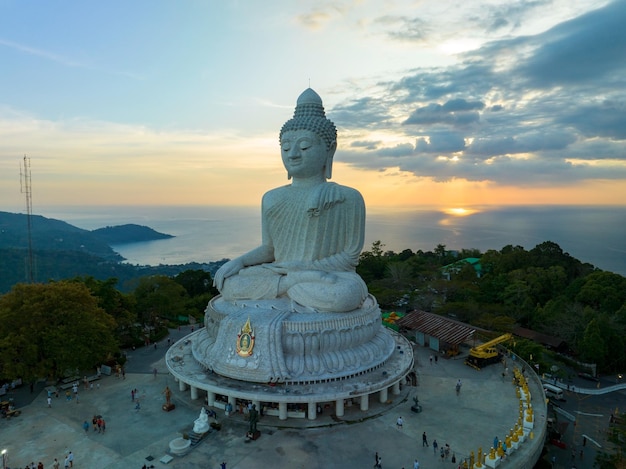 Big buddha on high mountain in Phuket ThailandAmazing light of sunset nature Landscape nature background