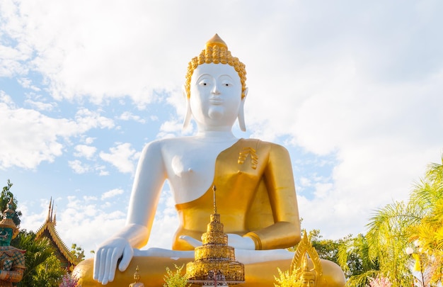 Big Buddha statue Wat Phra That Doi Kham at Chiang Mai,Thai temple Northern  Thailand