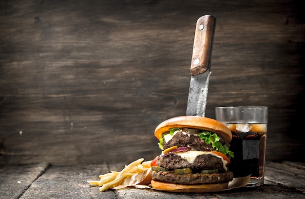 Big burger with cola and fries