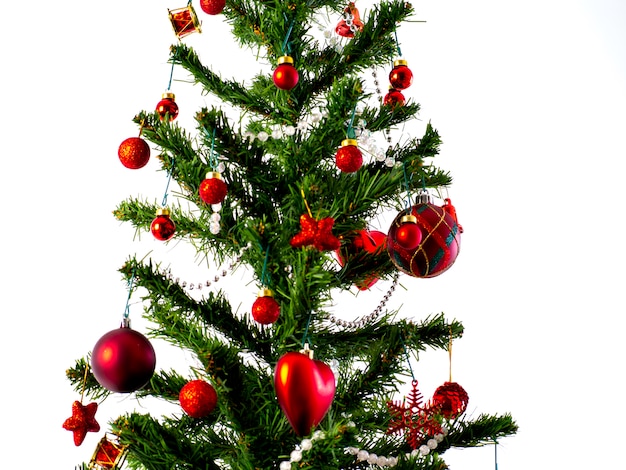 Big Christmas tree decorated with stars and beautiful red balls celebrate the festival.