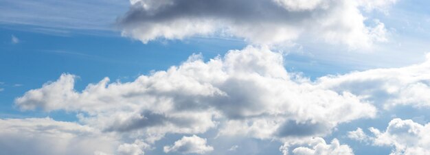 A big curly cloud in a blue sky on a sunny day