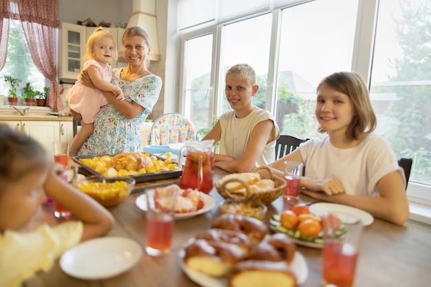 Big family at the dinner table at home.