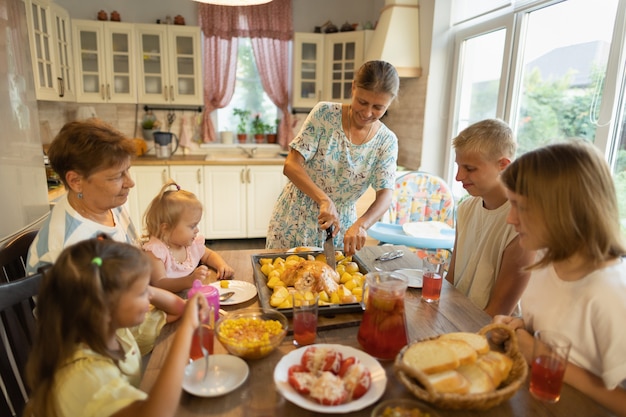 Big family at the dinner table at home.