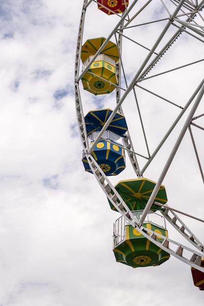 Big ferris wheel against the sky on a cloudy day