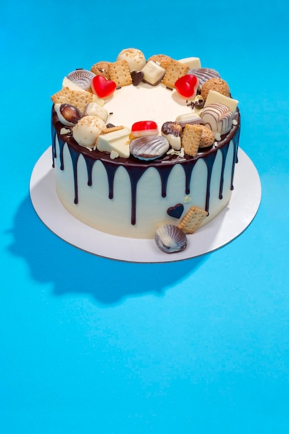 Big festive cake on a blue background