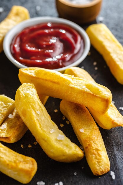 Big french fries Fried potato chips with ketcheup