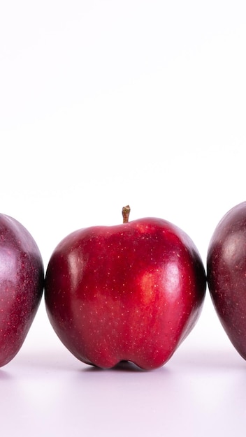 Big fresh red apples on white background