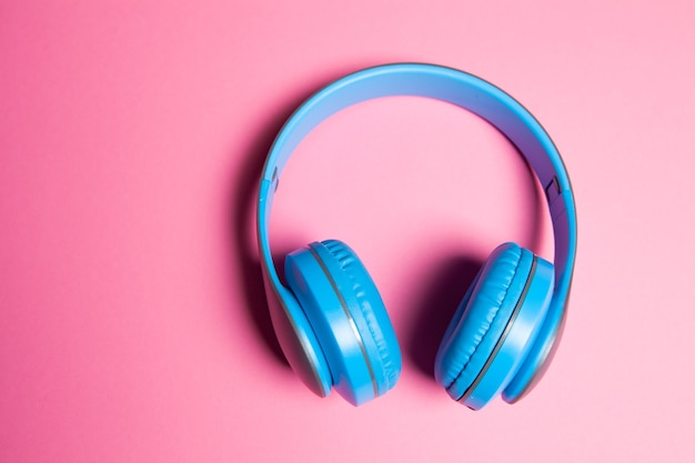 Big headphones on a pink background