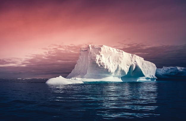 Big massive iceberg floating on the ocean