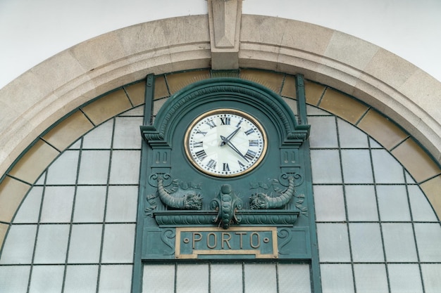 Big mechanical clock of the Sao Bento train station in Porto Portugal