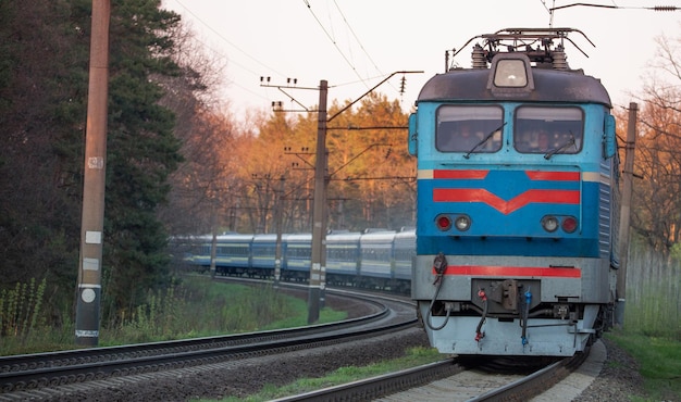 Big passenger train at dawn, selective focus