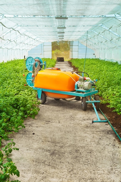 Big pesticide sprayer in greenhouse