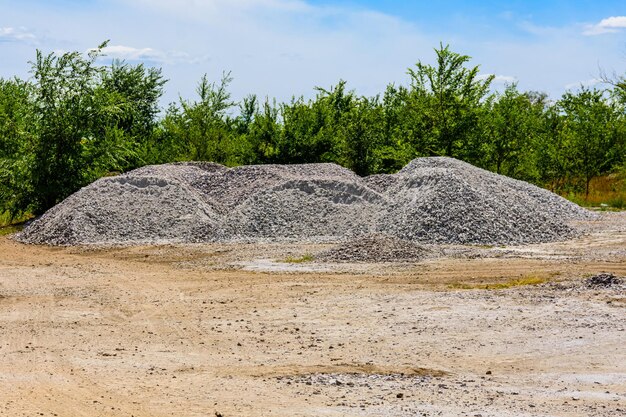 Big piles of rubble near the roadside