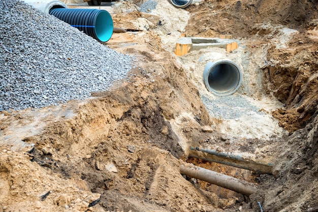 Big pipe or tube for water sewer on construction site during road repair