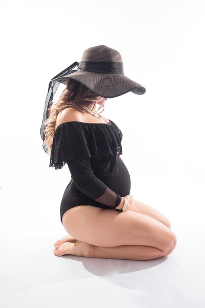 Foto grande pancia incinta bambino che porta la maternità