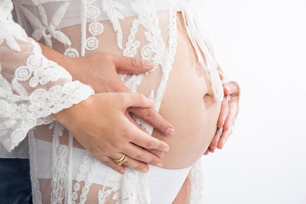 Foto grande pancia incinta bambino che porta la maternità