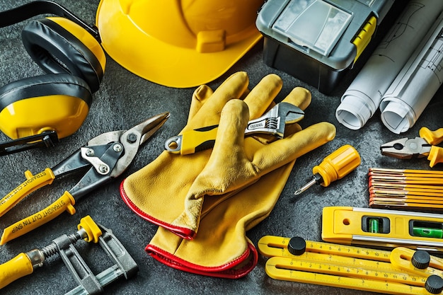 Big set of construction tools on black background