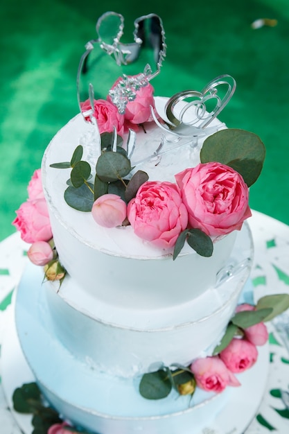 Big sweet wedding cake for newlyweds