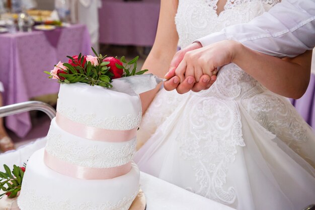 Big sweet wedding cake for newlyweds