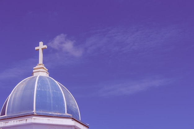 big white cross on blue sky