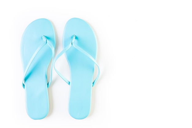 Bight women's flip flops on isolated background.