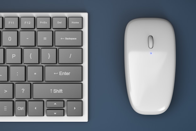 Bijgesneden draadloze computertoetsenbord en muis op tafel.