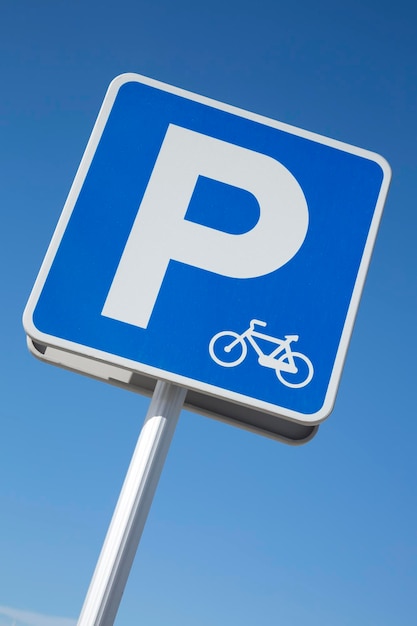 Bike Lane Symbol Parking Sign on Blue Sky Background