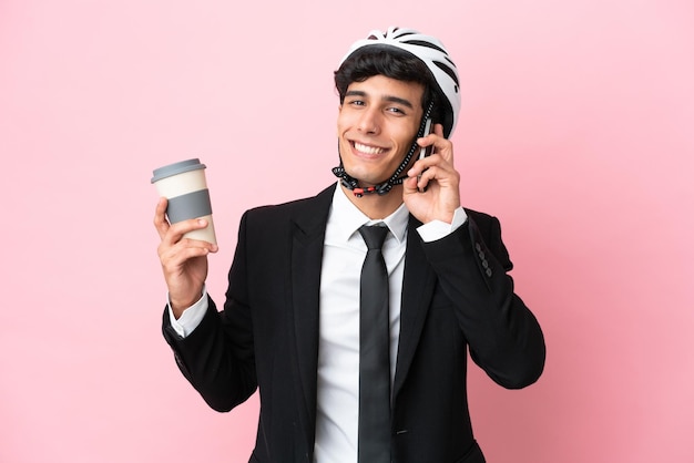 biker man over isolated pink background