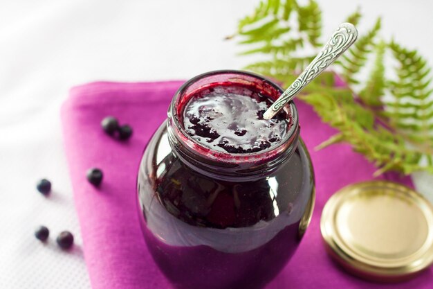 Bilberry confiture in a glass jar