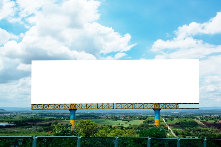 Photo billboard blank and blue sky, copy space on white screen
