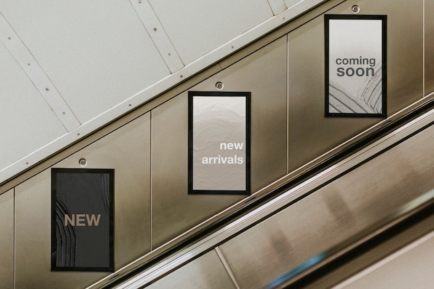 Billboard screens by underground escalator