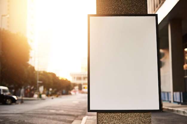 Billboard sign and ads in city for marketing or promotion on background outdoor at sunset Banner commercial and placeholder for announcement in street mockup space or information for sales offer