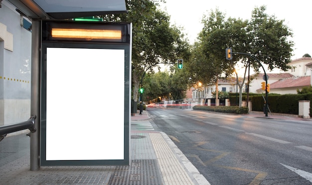 Billboard at taxi rank at sunset in the city