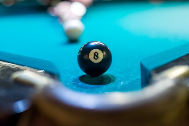 Billiard ball is on billiard table