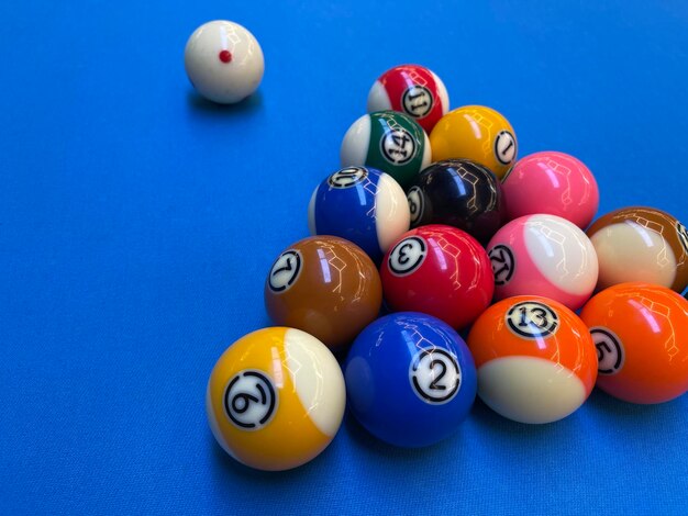 Photo billiard balls pool game on a blue table