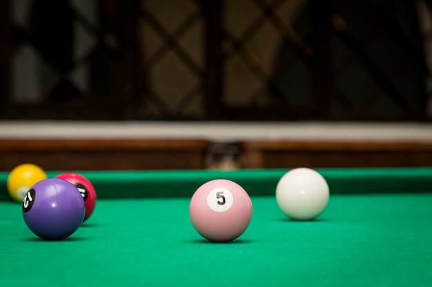 Billiard Balls in a pool table.