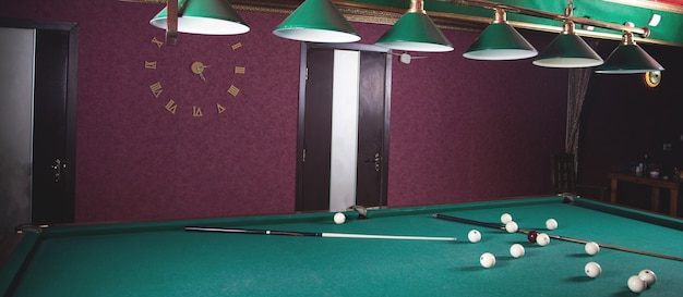 Billiard room interior. Green table for game