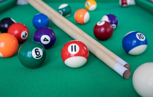 Billiard table with a selection of balls and cues Game Snooker billiards
