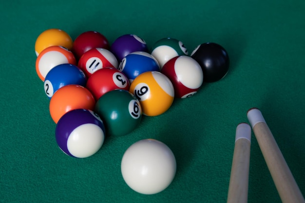 Billiard table with a selection of balls and cues Game Snooker billiards