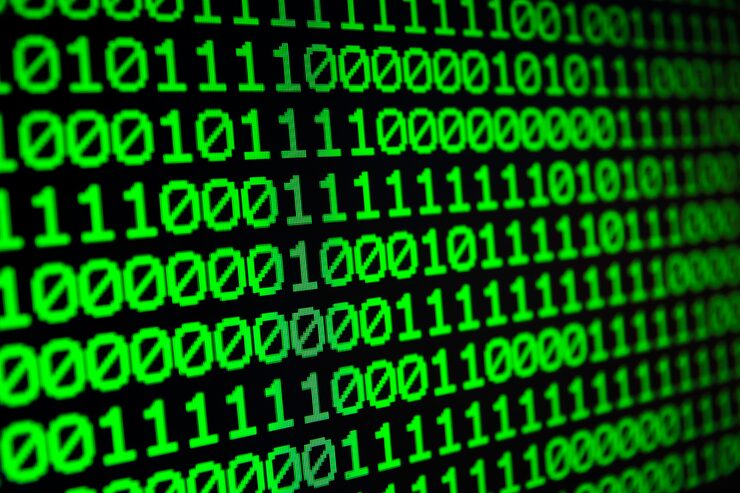 Photo binary matrix computer data code seamless background. binary code for programming